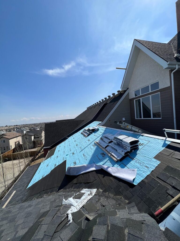 HKS Construction fortifies Chaparral Ridge with IKO Cambridge Class 3 shingles on a full commercial condo re-roof in Calgary