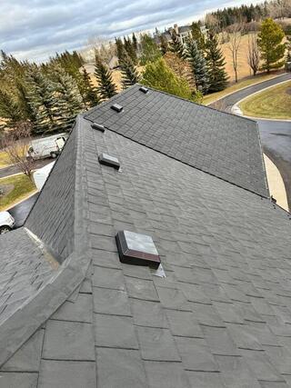 beautiful rubebr roof left slopes shown house by a road in rural area