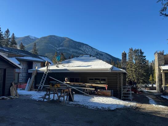 roof snow removal before shingle installation in Canmore, AB