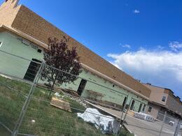 commercial siding renovation, soft metals and parapet wall metal siding