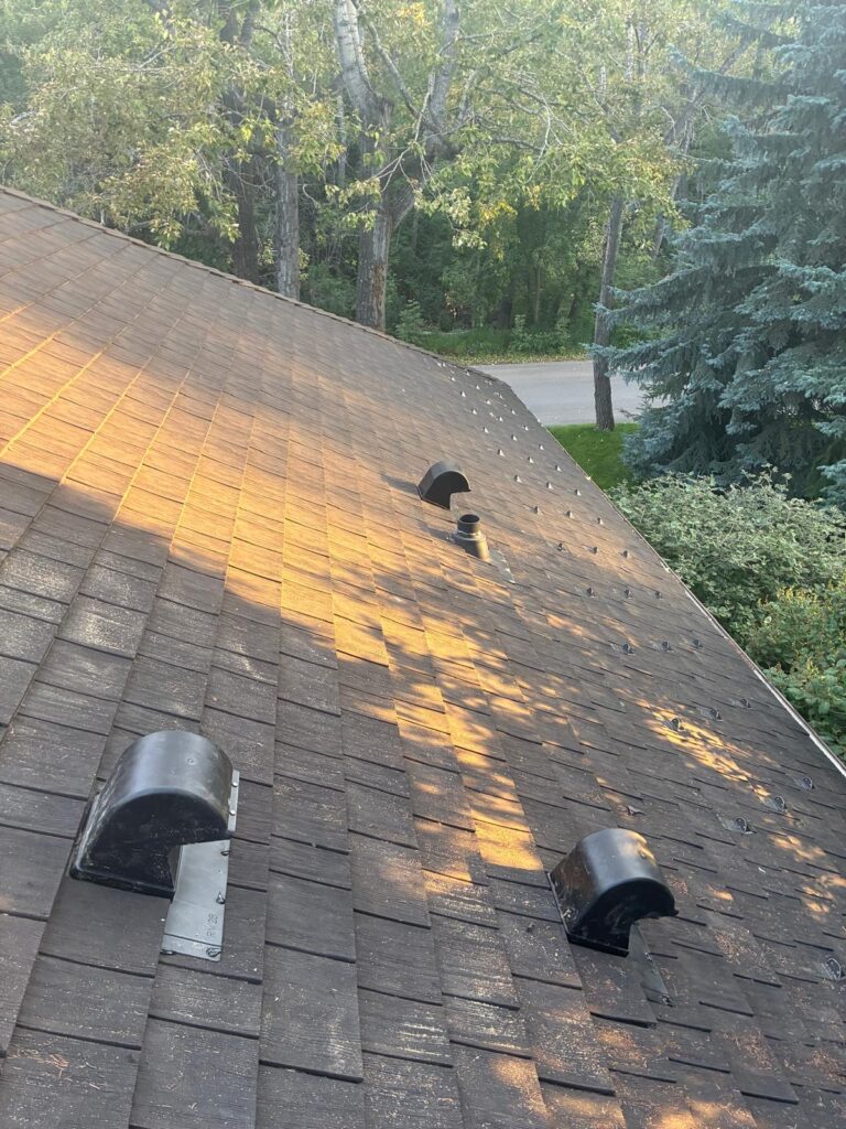 new cedar roof with new accessories and ice damming spikes