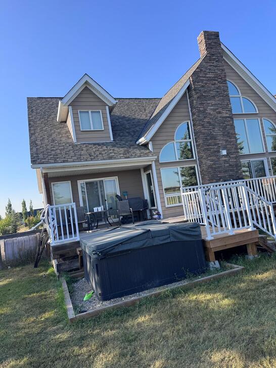 new roof, new hardie board siding, masonry to chimney and soft metal renovation to home in calgary ab