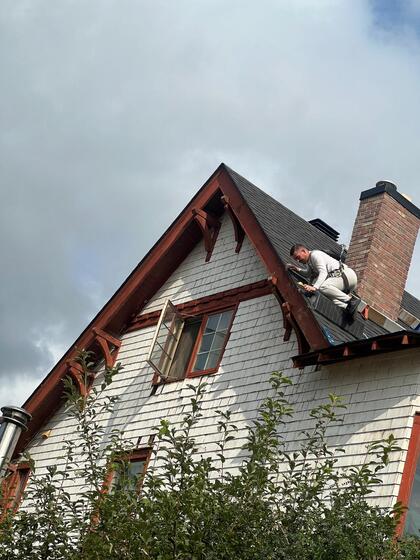 HKS Construction roofer repairing a roof in Calgary