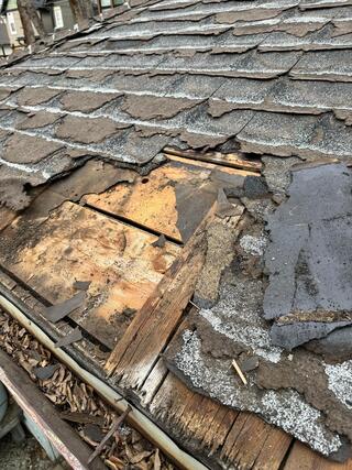 severly deteriorated shingles water penetrated roof deck at eaves perimeter